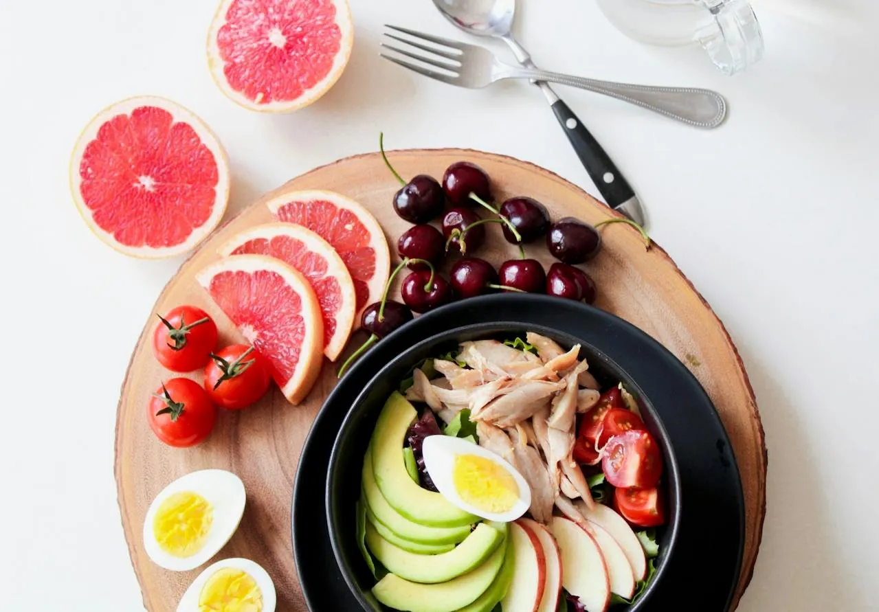 How do you safely transition back to solid foods after fasting?