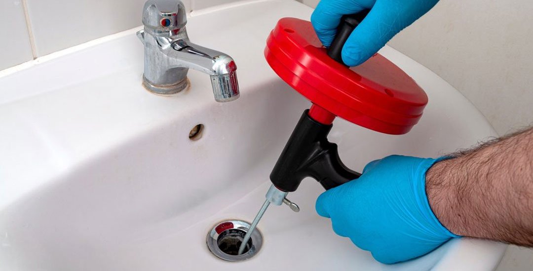 Why do plumbers say not to use drain cleaner?